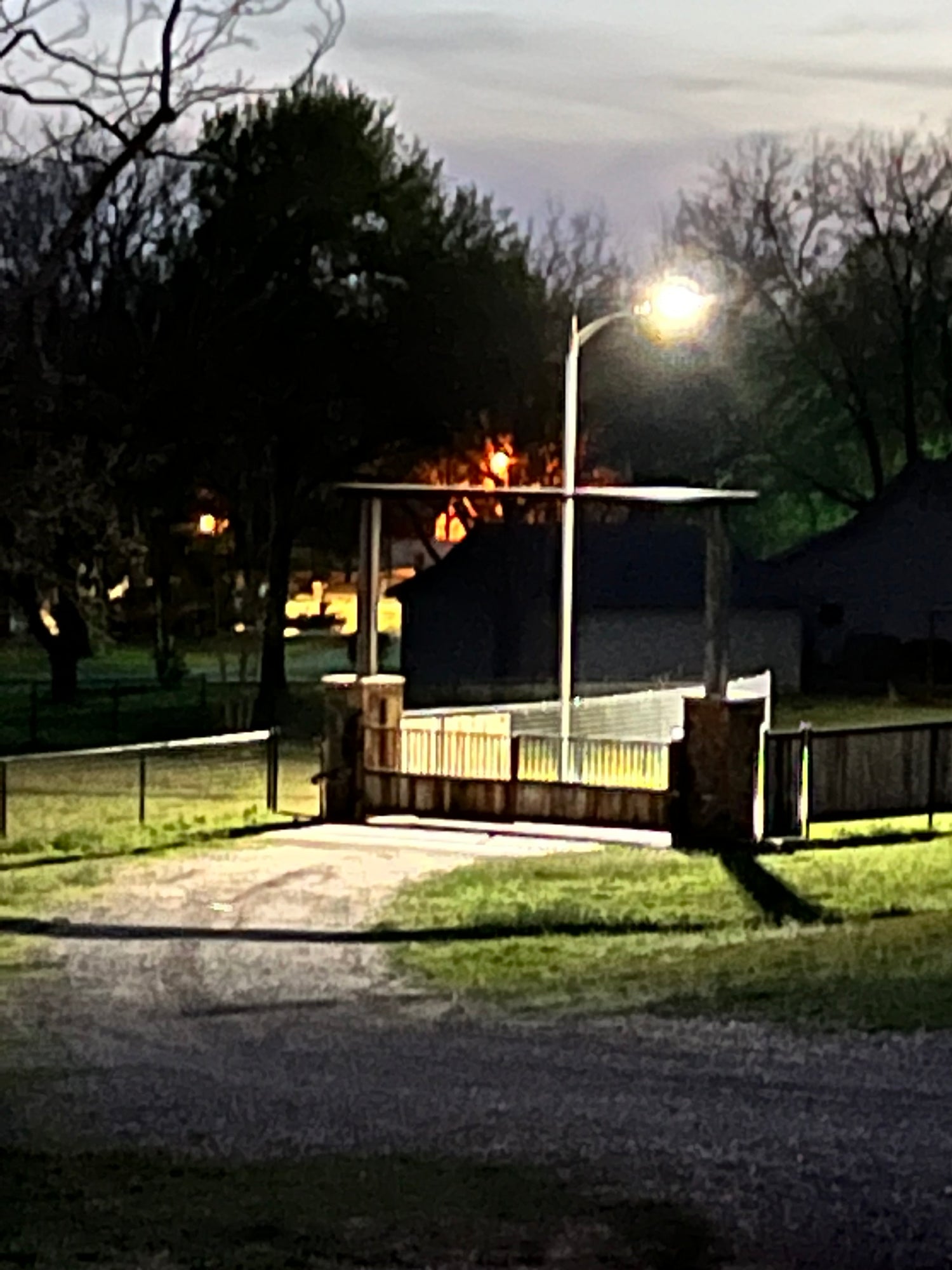 A single Rocket Lights Titan 850 solar light on a gated entry.